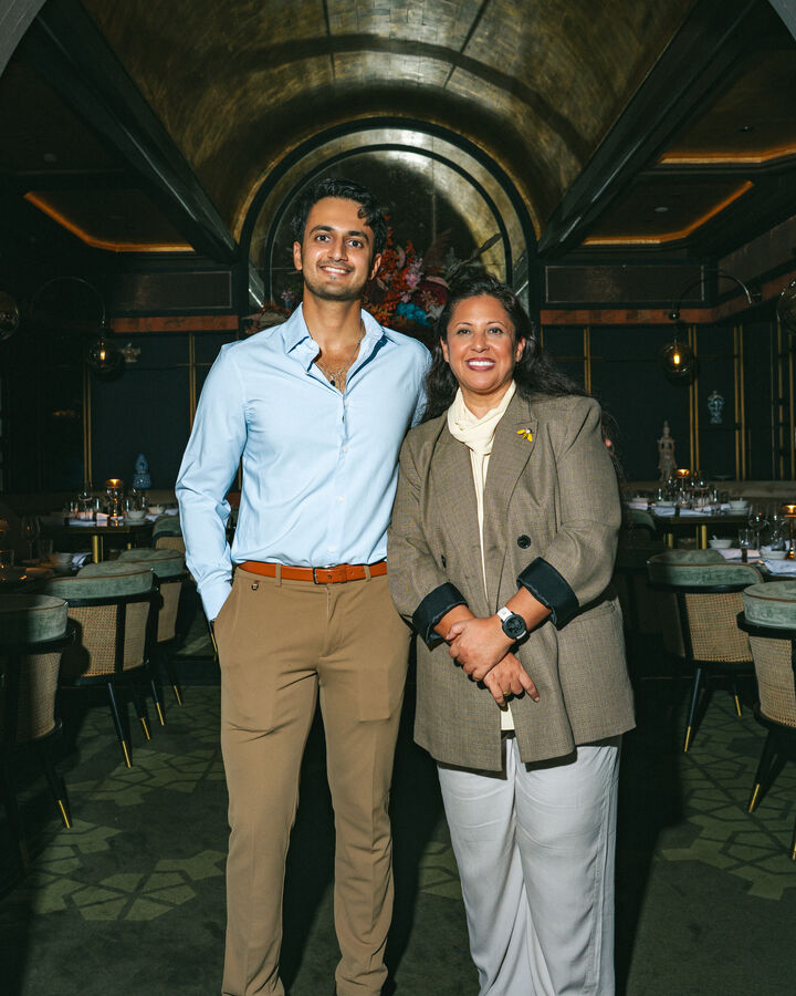 Two people standing together.